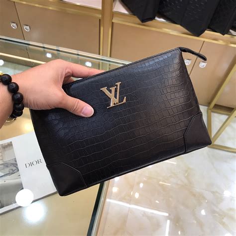 lv men clutch bag|lv clutch bag price.